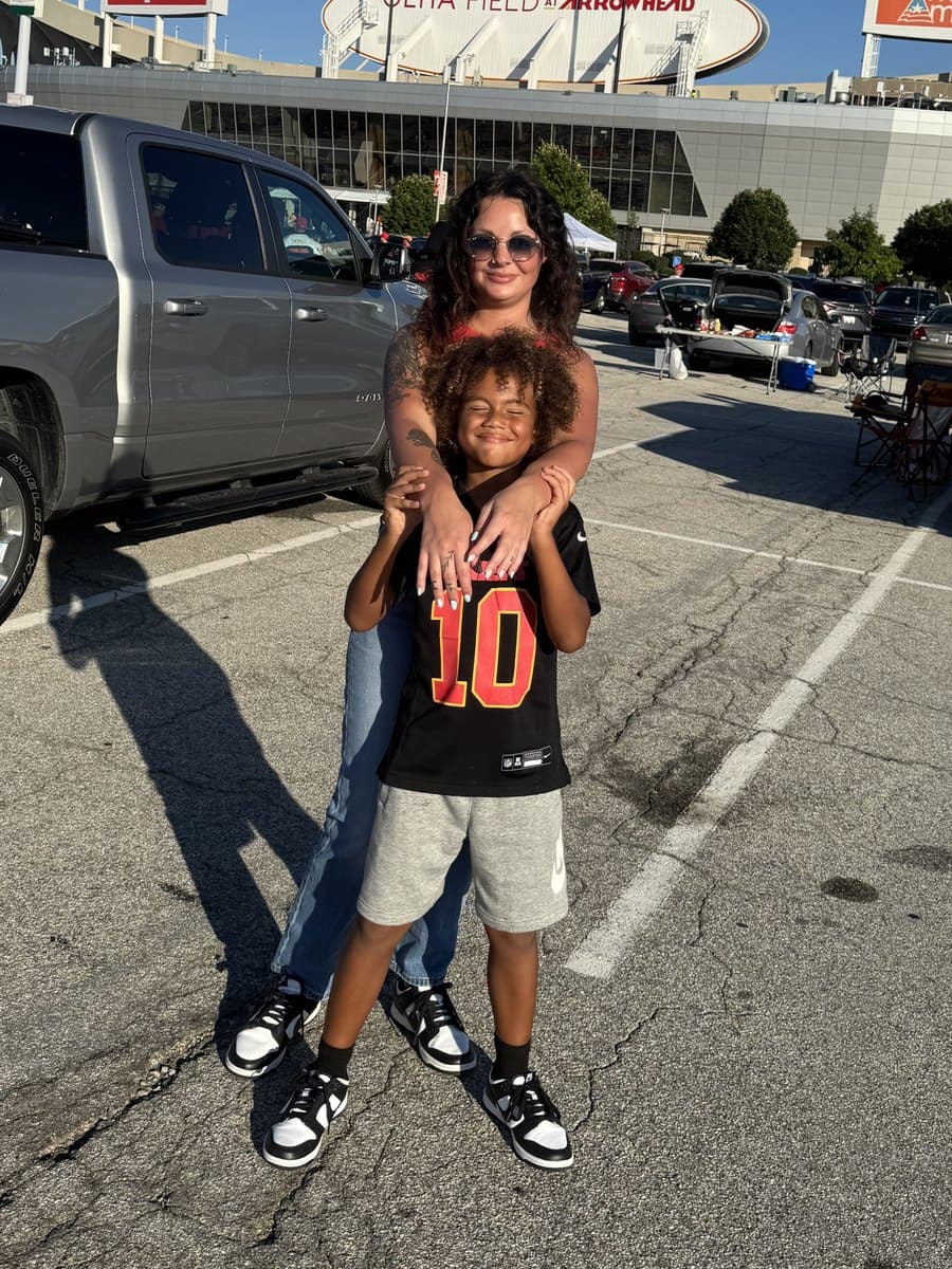 Maloree, L&D nurse and founder of Matriarch Command, with her son